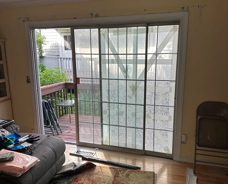 Patio door with a rotting frame